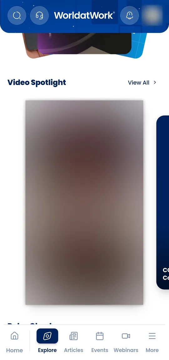 A video spotlight rail on the Explore tab, showing a full-bleed vertical video